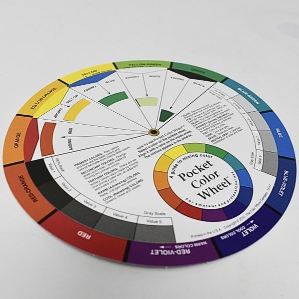 Pocket Color Wheel Mixing Guide showing a rotating color wheel with primary, secondary, and complementary colors for color mixing and coordination.